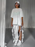 Amozae-High Waist Bodycon Long Skirt For Women 2023 Casual Hollow Out Tassel Faldas Ajustadas Side Slit Party Maxi Skirts Woman
