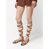 Amozae-2024 Spring/Summer New European and American Roman Flat Bottom Riveted Fashion Clip Toe Sandals Women's Banquet Sandals